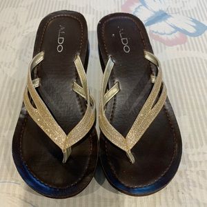 Tiny wedge flip flops by Aldo